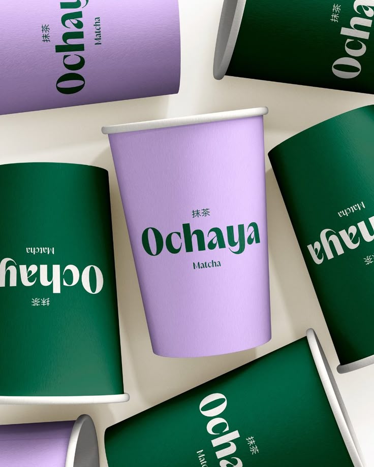 Ochaya Matcha branded paper cups in lavender and forest green