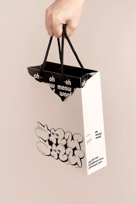 Oh Meow Woof custom die-cut paper shopping bag with rope handles